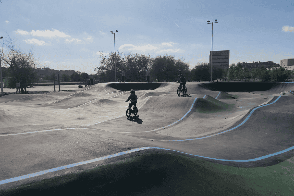 Kids riding bikes on a pumptrack