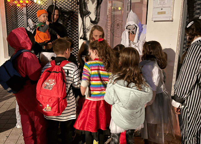 Kids in Madrid trick or treating on Halloween